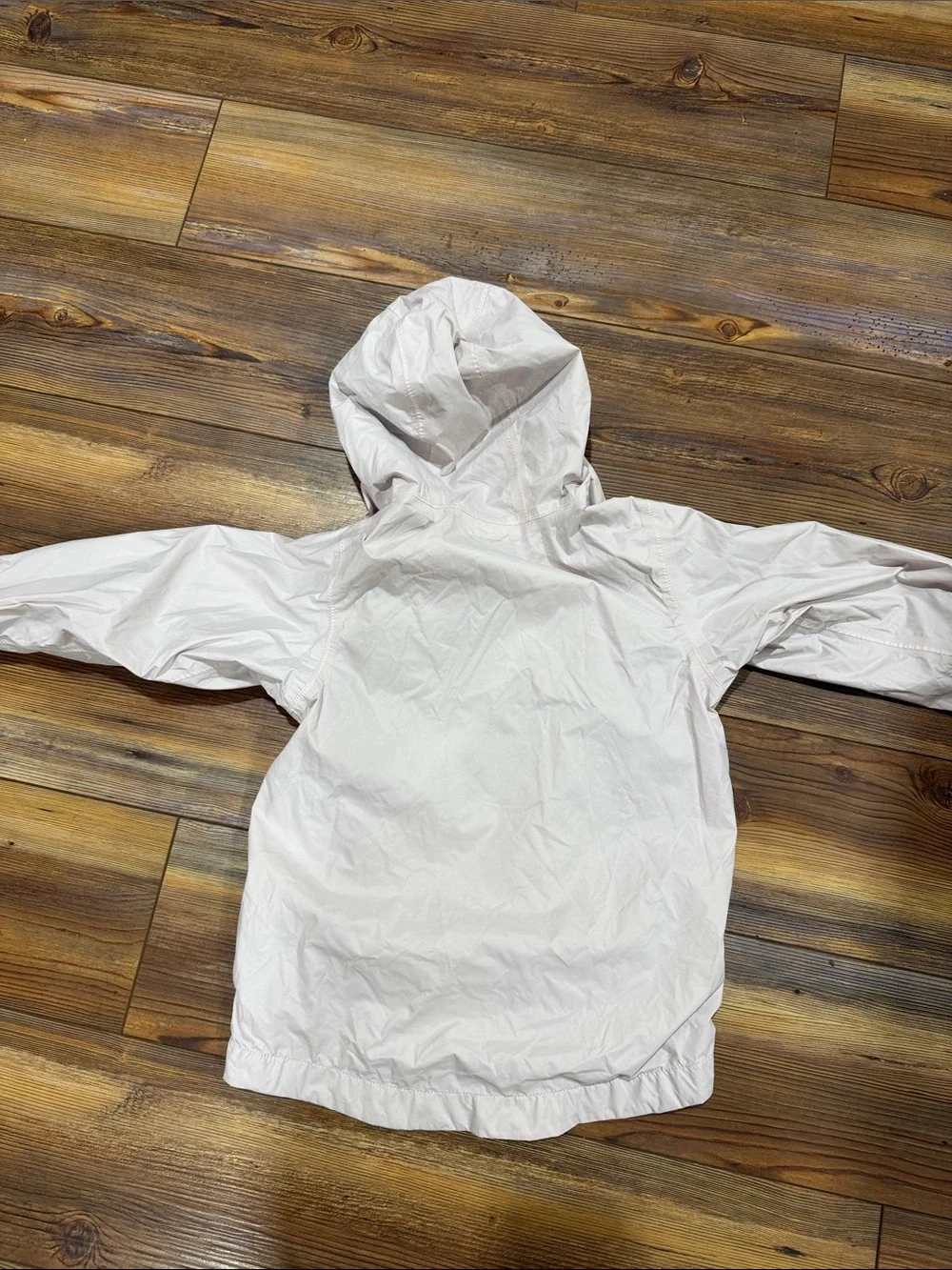 The North Face Kids Hooded Rain Jacket in Light Pink and Black